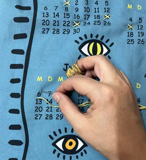 Datum mit Kreuzstich markieren